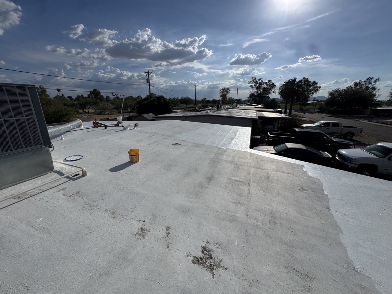 Completed white roof coating, residential Tucson property