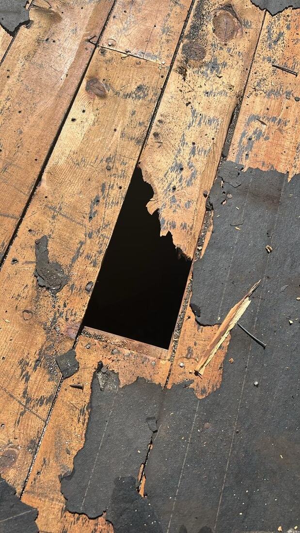 Roof deck damage before repair