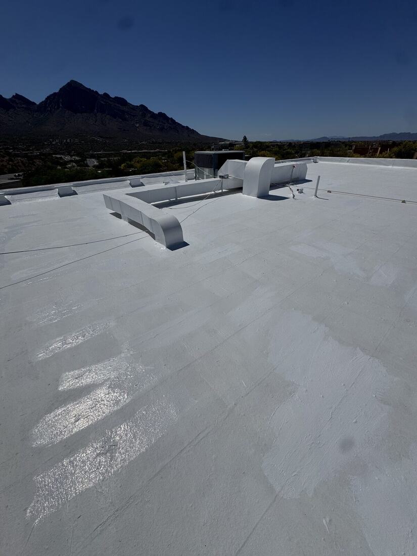 Roof coating around HVAC unit and vents